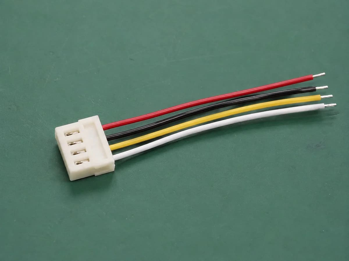 Representative PH-format four-position lead showing populated terminal-retention windows